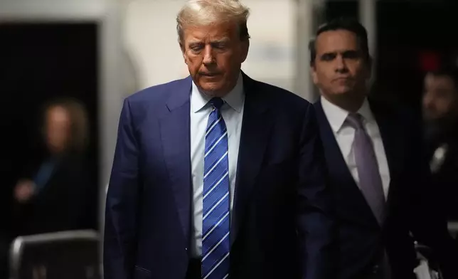 Former President Donald Trump arrives at Manhattan criminal court, Tuesday, April 16, 2024, in New York. Donald Trump returned to the courtroom Tuesday as a judge works to find a panel of jurors who will decide whether the former president is guilty of criminal charges alleging he falsified business records to cover up a sex scandal during the 2016 campaign. (AP Photo/Mary Altaffer, Pool)
