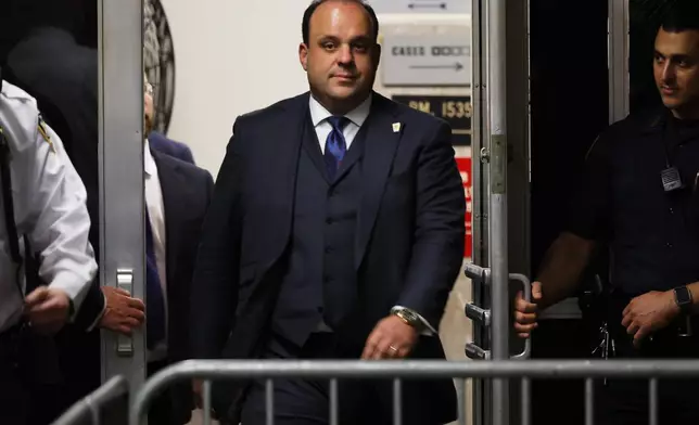 Boris Epshteyn, an aide to former President Donald Trump, returns to the courtroom after a lunch recess during Trump's trial at Manhattan criminal court before his trial in New York, Friday, April 26, 2024. (Michael M. Santiago/Pool Photo via AP)
