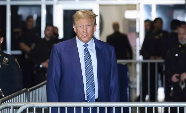 Former President Donald Trump speaks to the press at the end of the second day of jury selection for his trial at a Manhattan criminal court, Tuesday, April 16, 2024, in New York. (Curtis Means/Pool Photo via AP)