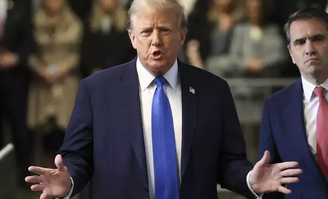 Former president Donald Trump speaks upon arriving at Manhattan criminal court, Monday, April 22, 2024, in New York. Opening statements in Donald Trump's historic hush money trial are set to begin. Trump is accused of falsifying internal business records as part of an alleged scheme to bury stories he thought might hurt his presidential campaign in 2016. (AP Photo/Yuki Iwamura, Pool)