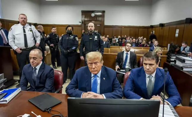 Former President Donald Trump appears at Manhattan criminal court before his trial in New York, Friday, April 26, 2024. (Mark Peterson/Pool Photo via AP)