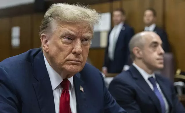 FILE - Former President Donald Trump attends jury selection at Manhattan criminal court in New York, April 15, 2024. Trump's criminal hush money trial involves allegations that he falsified his company's records to hide the true nature of payments to his former lawyer Michael Cohen, who helped bury negative stories about him during the 2016 presidential campaign. He's pleaded not guilty. (Jeenah Moon/Pool Photo via AP, File)