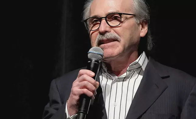 FILE - David Pecker, chairman and CEO of American Media, speaks at an event, Jan. 31, 2014 in New York. Pecker is The National Enquirer's former publisher and a longtime friend of Donald Trump. Prosecutors say he met with Trump and Trump's former lawyer Michael Cohen at Trump Tower in August 2015 and agreed to help Trump's campaign identify negative stories about him. (Marion Curtis via AP, File)