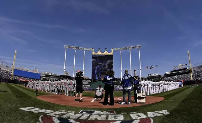 An Air Force B2 bomber flies over Kauffman Stadium before a baseball game between the Kansas City Royals and the Minnesota Twins Thursday, March 28, 2024, in Kansas City, Mo. (AP Photo/Charlie Riedel)