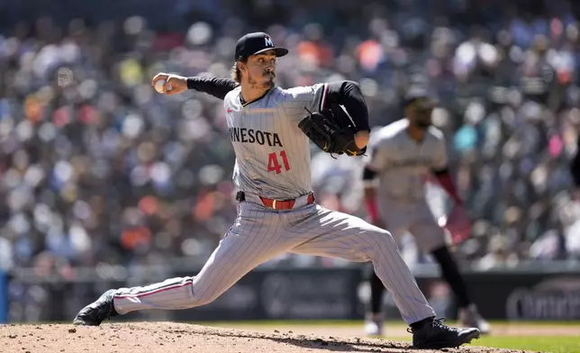 Minnesota Twins pitcher Joe Ryan (41) throws against the Detroit Tigers in the sixth inning during the first baseball game of a doubleheader, Saturday, April 13, 2024, in Detroit. (AP Photo/Paul Sancya)