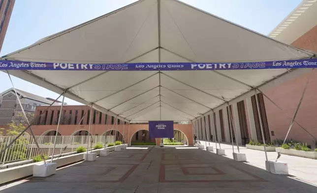 A poetry stage is prepared for the upcoming The Los Angeles Times Festival of Books, a free public festival held annually at the University of Southern California campus, in Los Angeles, Tuesday, April 16, 2024. University of Southern California officials have canceled a commencement speech by its 2024 valedictorian, a pro-Palestinian Muslim, citing "substantial risks relating to security and disruption" of the event that draws 65,000 people to campus. (AP Photo/Damian Dovarganes)