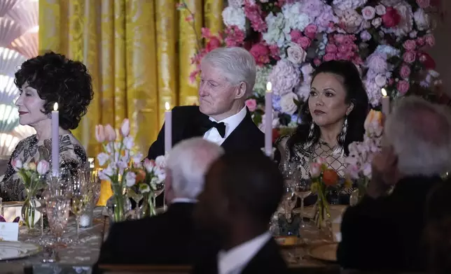 Former President Bill Clinton listens to toast by President Joe Biden and Japanese Prime Minister Fumio Kishida during a State Dinner at the White House, Wednesday, April 10, 2024, in Washington. (AP Photo/Evan Vucci)