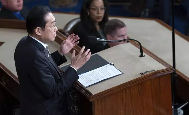 Japan's Prime Minister Fumio Kishida addresses a joint meeting of Congress in the House chamber, Thursday, April 11, 2024, at the Capitol in Washington. (AP Photo/Jose Luis Magana)