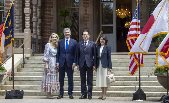 North Carolina first lady Kristin Cooper, North Carolina Gov. Roy Copper, Japan Prime Minister Fumio Kishida and Japan first lady Yuko Kishida pose for a photograph before attending a luncheon at the North Carolina Executive Mansion, Friday, April 12, 2024, in Raleigh, N.C. (Robert Willett/The News &amp; Observer via AP, Pool)