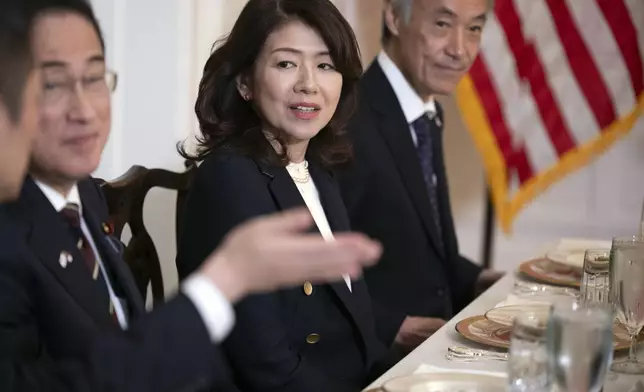 Japan first lady Yuko Kishida, center, is flanked by Prime Minister Fumio Kishida, left and Shigeo Yamada, Japan Ambassador to the United States, during a luncheon in honor of the Prime Minister at the North Carolina Executive Mansion, Friday, April 12, 2024, in Raleigh, N.C. (Robert Willett/The News &amp; Observer via AP, Pool)