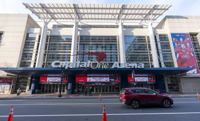 FILE - Capital One Arena is shown before an NHL hockey game between the Washington Capitals and the New Jersey Devils, Tuesday, Feb. 20, 2024, in Washington. The NBA’s Washington Wizards and NHL’s Washington Capitals are staying in the District of Columbia. Owner Ted Leonsis and Mayor Muriel Bowser announced the development at a news conference at Capital One Arena on Wednesday, March 27, 2024. (AP Photo/Alex Brandon, File)