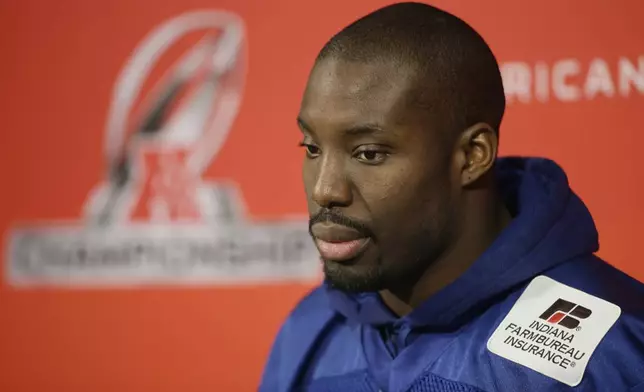 FILE - Indianapolis Colts' Vontae Davis listens to a question during a news conference ahead of the AFC Championship game against the New England Patriots at the NFL football team's practice facility Friday, Jan. 16, 2015, in Indianapolis. Former Miami Dolphins and Indianapolis Colts cornerback Vontae Davis was found dead in his South Florida home on Monday, April 1, 2024, but police say no foul play is suspected.(AP Photo/Darron Cummings, File)