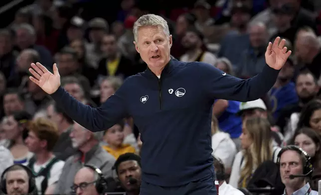 Golden State Warriors coach Steve Kerr reacts to a call during the second half of the team's NBA basketball game against the Portland Trail Blazers in Portland, Ore., Thursday, April 11, 2024. (AP Photo/Steve Dykes)