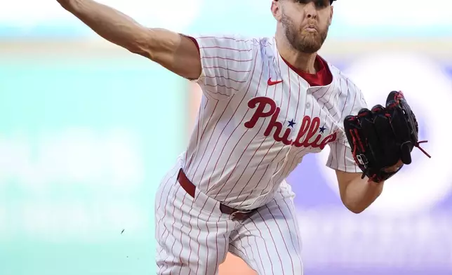 Philadelphia Phillies' Zack Wheeler pitches during the second inning of a baseball game against the Chicago White Sox, Saturday, April 20, 2024, in Philadelphia. (AP Photo/Matt Slocum)