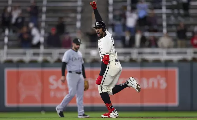 Minnesota Twins Byron Buxton celebrates while running the bases on a home run against the Chicago White Sox during the ninth inning of a baseball game Tuesday, April 23, 2024, in Minneapolis. (AP Photo/Stacy Bengs)
