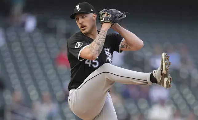 Chicago White Sox starting pitcher Garrett Crochet winds up during the second inning of the team's baseball game against the Minnesota Twins, Wednesday, April 24, 2024, in Minneapolis. (AP Photo/Abbie Parr)