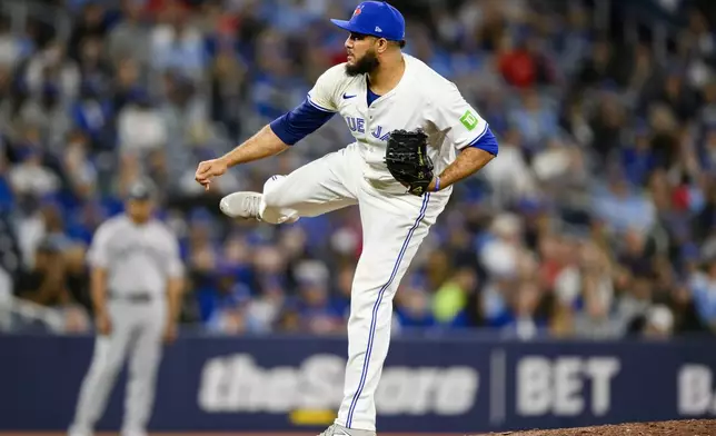 Toronto Blue Jays pitcher Yimi García throws the ball during ninth inning of a baseball game against the New York Yankees in Toronto on Monday, April 15, 2024. (Christopher Katsarov/The Canadian Press via AP)