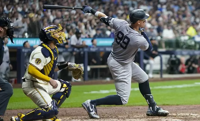 New York Yankees' Aaron Judge hits a two-run home run during the sixth inning of a baseball game against the Milwaukee Brewers Saturday, April 27, 2024, in Milwaukee. (AP Photo/Morry Gash)
