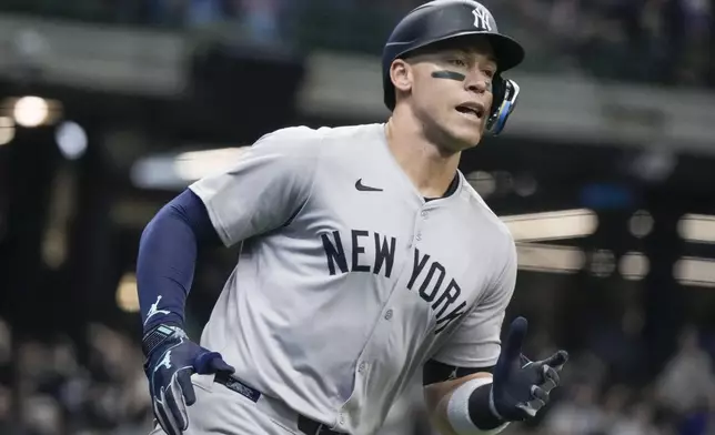 New York Yankees' Aaron Judge reacts after hitting a home run during the first inning of a baseball game against the Milwaukee Brewers Sunday, April 28, 2024, in Milwaukee. (AP Photo/Morry Gash)