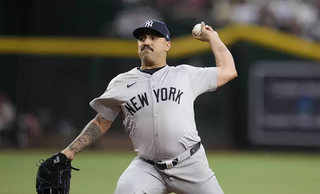New York Yankees starting pitcher Nestor Cortes throws against the Arizona Diamondbacks during the first inning of a baseball game Tuesday, April 2, 2024, in Phoenix. (AP Photo/Ross D. Franklin)