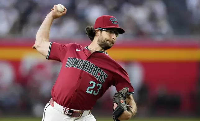 Arizona Diamondbacks starting pitcher Zac Gallen throws against the New York Yankees during the first inning of a baseball game Tuesday, April 2, 2024, in Phoenix. (AP Photo/Ross D. Franklin)