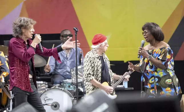 Mick Jagger, left, Steve Jordan, Keith Richards and Irma Thomas perform with the Rolling Stones during the New Orleans Jazz &amp; Heritage Festival on Thursday, May 2nd, 2024, at the Fair Grounds Race Course in New Orleans. (Photo by Amy Harris/Invision/AP)