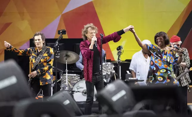 Ron Wood, left, Mick Jagger and Irma Thomas perform with the Rolling Stones during the New Orleans Jazz &amp; Heritage Festival on Thursday, May 2nd, 2024, at the Fair Grounds Race Course in New Orleans. (Photo by Amy Harris/Invision/AP)