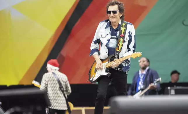 Ron Wood, of the Rolling Stones, performs during the New Orleans Jazz &amp; Heritage Festival on Thursday, May 2nd, 2024, at the Fair Grounds Race Course in New Orleans. (Photo by Amy Harris/Invision/AP)