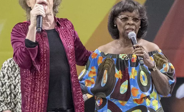 Mick Jagger, left, and Irma Thomas perform with the Rolling Stones during the New Orleans Jazz &amp; Heritage Festival on Thursday, May 2nd, 2024, at the Fair Grounds Race Course in New Orleans. (Photo by Amy Harris/Invision/AP)