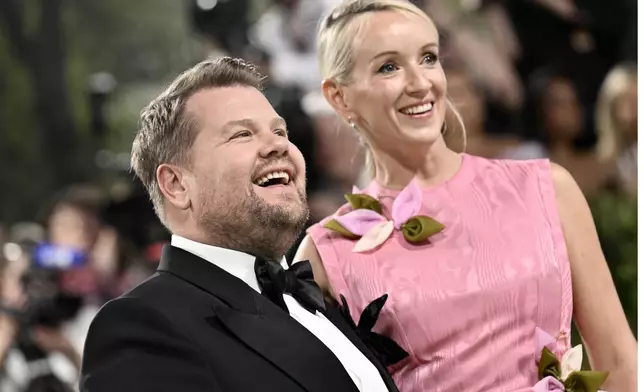 James Corden, left, and Julia Carey attend The Metropolitan Museum of Art's Costume Institute benefit gala celebrating the opening of the "Sleeping Beauties: Reawakening Fashion" exhibition on Monday, May 6, 2024, in New York. (Photo by Evan Agostini/Invision/AP)