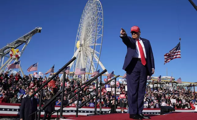 Republican presidential candidate former President Donald Trump gestures to the crowd during a campaign rally in Wildwood, N.J., Saturday, May 11, 2024. (AP Photo/Matt Rourke)