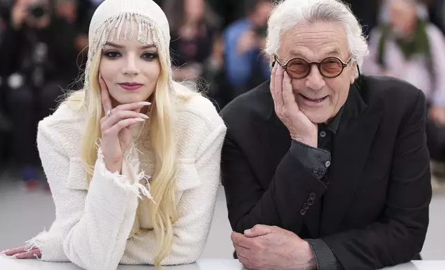 Anya Taylor-Joy, left, and director George Miller pose for photographers at the photo call for the film 'Furiosa: A Mad Max Saga' at the 77th international film festival, Cannes, southern France, Thursday, May 16, 2024. (Photo by Scott A Garfitt/Invision/AP)
