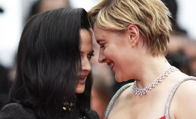 Jury member Eva Green, left, and jury president Greta Gerwig pose for photographers upon arrival at the premiere of the film 'Furiosa: A Mad Max Saga' at the 77th international film festival, Cannes, southern France, Wednesday, May 15, 2024. (Photo by Scott A Garfitt/Invision/AP)