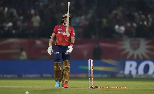 Punjab Kings' captain Sam Curran reacts after getting bowled out by Royal Challengers Bengaluru's Lockie Ferguson during the Indian Premier League cricket match between Punjab Kings and Royal Challengers Bengaluru in Dharamshala, India, Thursday, May 9, 2024. (AP Photo /Ashwini Bhatia)