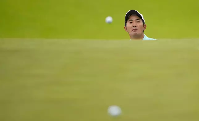 Takumi Kanaya, of Japan, chips to the green on the fourth hole during a practice round for the PGA Championship golf tournament at the Valhalla Golf Club, Wednesday, May 15, 2024, in Louisville, Ky. (AP Photo/Matt York)