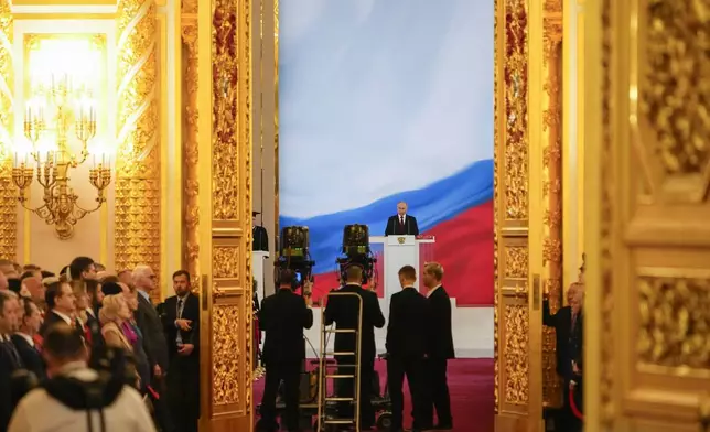 Vladimir Putin takes his oath as Russian president during an inauguration ceremony in the Grand Kremlin Palace in Moscow, Russia, Tuesday, May 7, 2024. (AP Photo/Alexander Zemlianichenko, Pool)