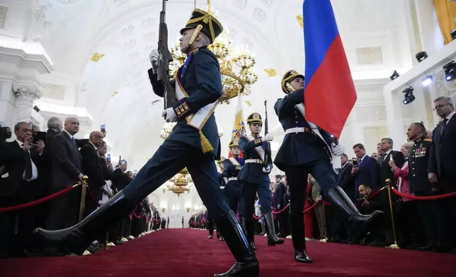 Honour guard soldiers attend Vladimir Putin's inauguration ceremony as Russian president in the Grand Kremlin Palace in Moscow, Russia, Tuesday, May 7, 2024. (AP Photo/Alexander Zemlianichenko, Pool)