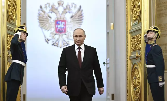 Vladimir Putin arrives for his inauguration ceremony as Russian president in the Grand Kremlin Palace in Moscow, Russia, Tuesday, May 7, 2024. (Sergei Bobylev, Sputnik, Kremlin Pool Photo via AP)