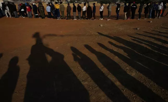 Voters line up to cast their ballot for general election in Alexandra, near Johannesburg, South Africa, Wednesday, May 29, 2024. (AP Photo/Themba Hadebe)