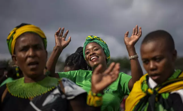Supporters of Ukhonto weSizwe party dance during an election meeting in Mpumalanga, near Durban, South Africa, Saturday, May 25, 2024, ahead of the 2024 general elections scheduled for May 29. (AP Photo/Emilio Morenatti)