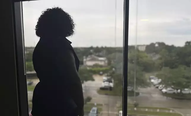 Louisiana Democratic state Rep. Delisha Boyd looks out the window in her office May 3, 2024, in New Orleans. As Boyd faces an uphill battle in Louisiana, as she attempts to advance a bill that would add cases of rape and incest as exceptions to Louisiana's near total abortion ban, the Democrat opens opening up about her mother's harrowing story and how it effected them. (AP Photo/Stephen Smith)