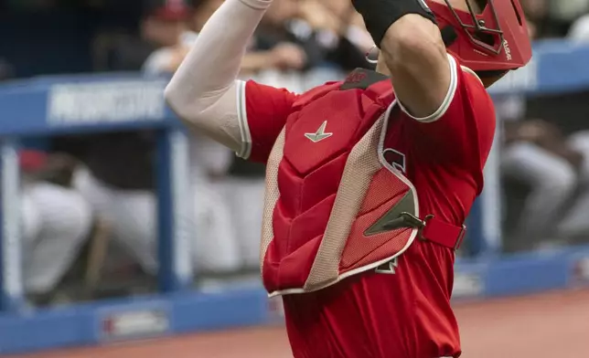 Los Angeles Angels' Logan O'Hoppe waits to catch a pop foul by Cleveland Guardians' Jose Ramirez during the first inning of a baseball game in Cleveland Saturday, May 4, 2024. (AP Photo/Phil Long)