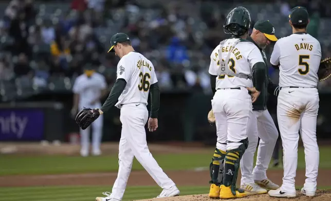 Oakland Athletics pitcher Ross Stripling (36) leaves during the fourth inning of the team's baseball game against the Houston Astros, Friday, May 24, 2024, in Oakland, Calif. (AP Photo/Godofredo A. Vásquez)