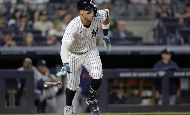 New York Yankees' Aaron Judge watches his two-run double against the Houston Astros during the sixth inning of a baseball game Wednesday, May 8, 2024, in New York. (AP Photo/Adam Hunger)