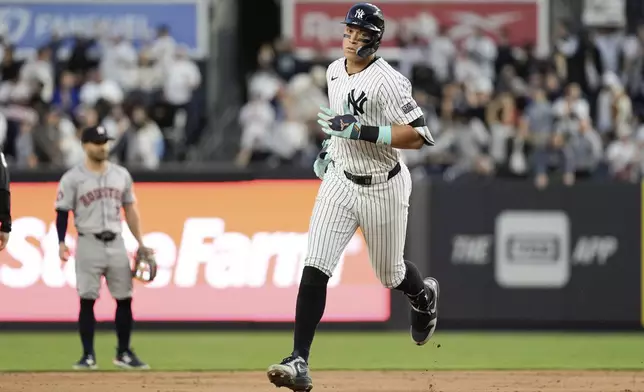 New York Yankees' Aaron Judge runs the bases after hitting a home run against the Houston Astros during the eighth inning of a baseball game Thursday, May 9, 2024, in New York. The Astros won 4-3. (AP Photo/Frank Franklin II)