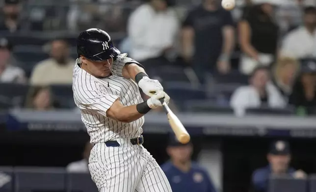 New York Yankees' Anthony Volpe hits a two-run home run during the fourth inning of a baseball game against the Houston Astros, Tuesday, May 7, 2024, in New York. (AP Photo/Frank Franklin II)
