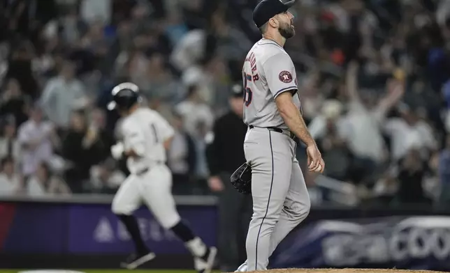 Houston Astros pitcher Justin Verlander, right, reacts as New York Yankees' Anthony Volpe runs the bases after hitting a two-run home run during the fourth inning of a baseball game, Tuesday, May 7, 2024, in New York. (AP Photo/Frank Franklin II)