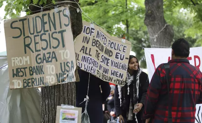 People attend a pro-Palestinians protest camp at the Vienna University Campus in Vienna, Austria, Tuesday, May 7, 2024. (AP Photo/Heinz-Peter Bader)