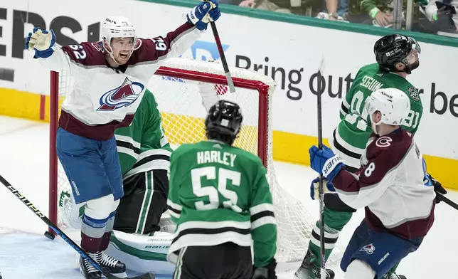 Colorado Avalanche left wing Artturi Lehkonen (62) reacts after teammate defenseman Cale Makar (8) scored a goal against the Dallas Stars during the third period in Game 5 of an NHL hockey Stanley Cup second-round playoff series, Wednesday, May 15, 2024, in Dallas. Looking on are Stars' Thomas Harley (55) and Tyler Seguin (91). (AP Photo/Tony Gutierrez)