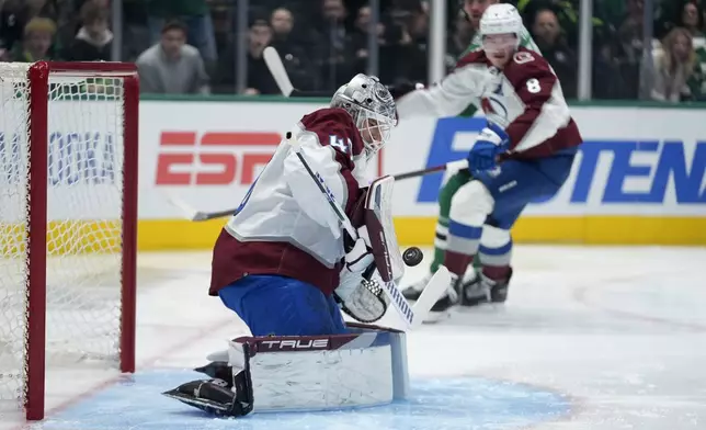 Colorado Avalanche goaltender Alexandar Georgiev blocks a shot in the first period in Game 2 of an NHL hockey Stanley Cup second-round playoff series against the Dallas Stars in Dallas, Tuesday, May 7, 2024. (AP Photo/LM Otero)